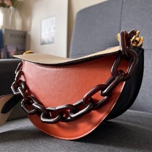 Yuzefi Doris crossbody bag with a plastic chain handle